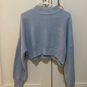 knit sweater, mock neck, fits slightly cropped